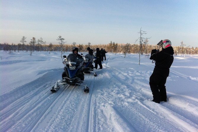 1-Hour Snowmobile Safari Experience - Riding with children in the guide’s sled