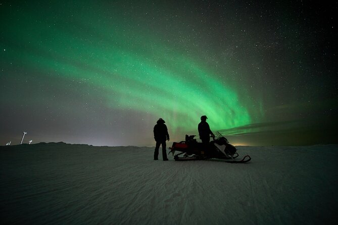 3 Hours Snowmobiling under Auroras and Night Sky - The tipi campfire stop