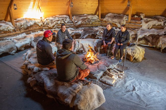 Authentic Reindeer Farm and Canoe Experience from Rovaniemi - Peaceful water, forest views, and seasonal changes