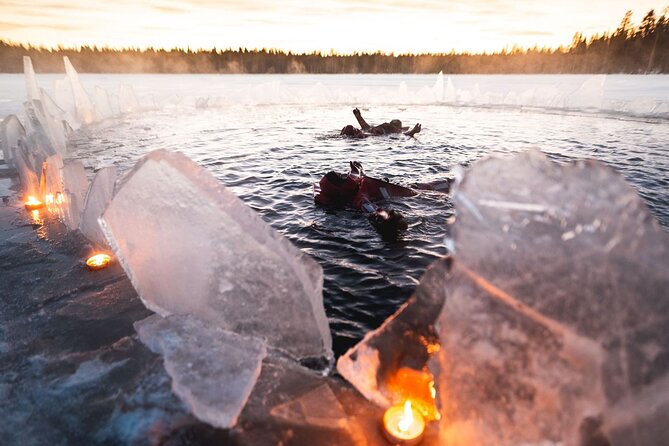 Daytime Arctic Ice-Floating in Rovaniemi, Small-Group - Getting suited up for the water