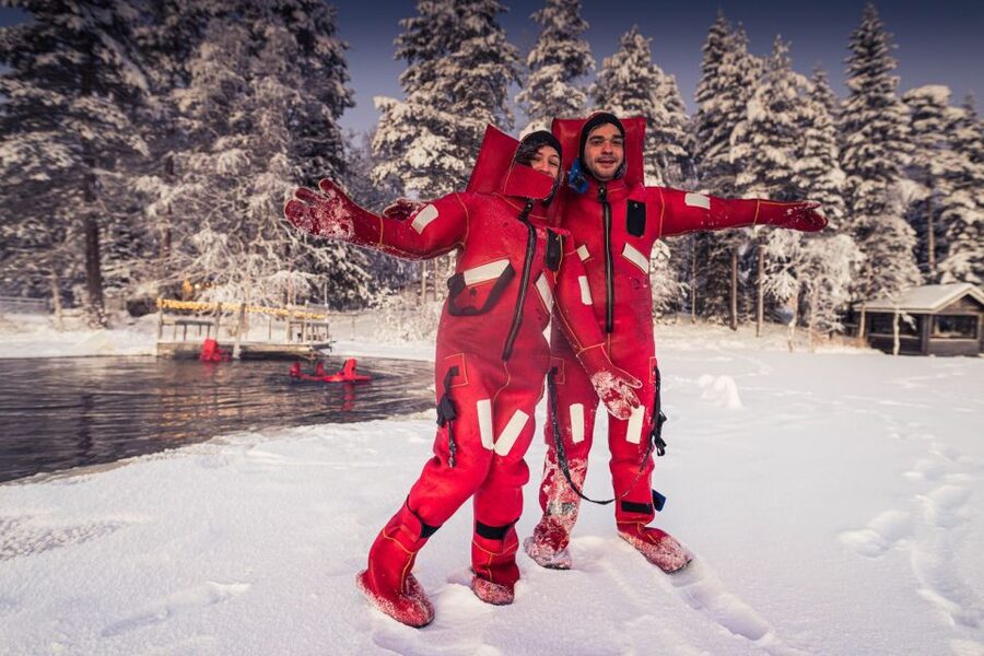 Daytime Ice Floating Rovaniemi, Frozen Lake Experience - Warming Up at the Cottage