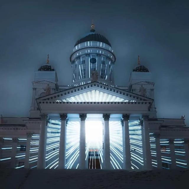 Discover the heart of Finland with a local guide. - Central Station and Finnish National Theatre