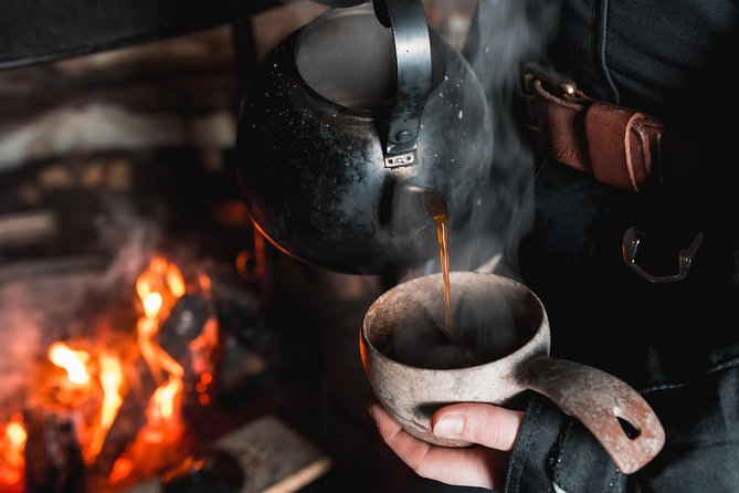 Evening Escape - Snowmobile safari and campfire in Rovaniemi - What the winter clothing adds