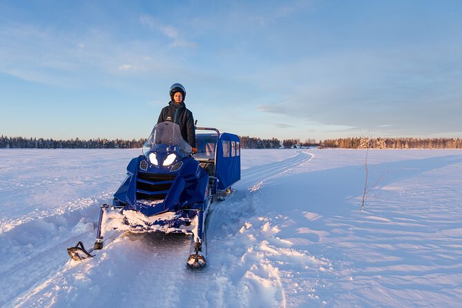 Family Snowmobiling in Rovaniemi, Apukka Resort - The forest ride through snowy Rovaniemi