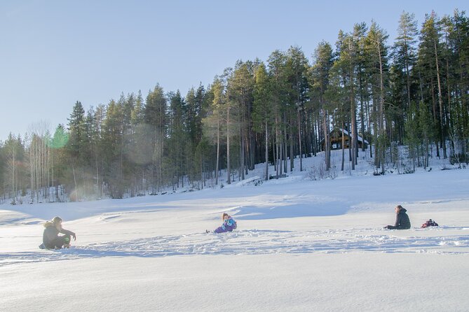 First Ice Fishing Experience in Rovaniemi - Staying Warm on the Frozen Lake