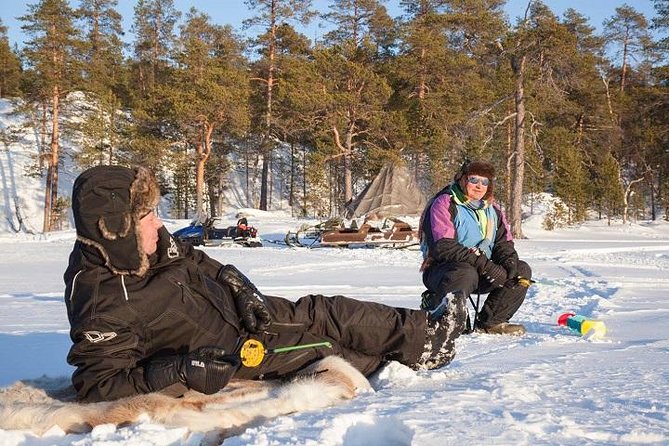 From Kakslauttanen: Ice Fishing Safari to Lake Inari, inc. lunch - Getting equipped at the Ivalo tour office