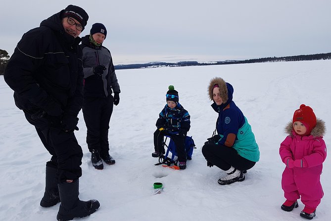 Ice fishing by car with hot beverages at Pyhä-Luosto - Learning the quiet rhythm of ice fishing