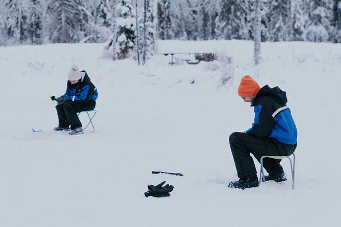 Ice Fishing by Snowmobile in Levi - Sausages, warm drinks, and a needed break