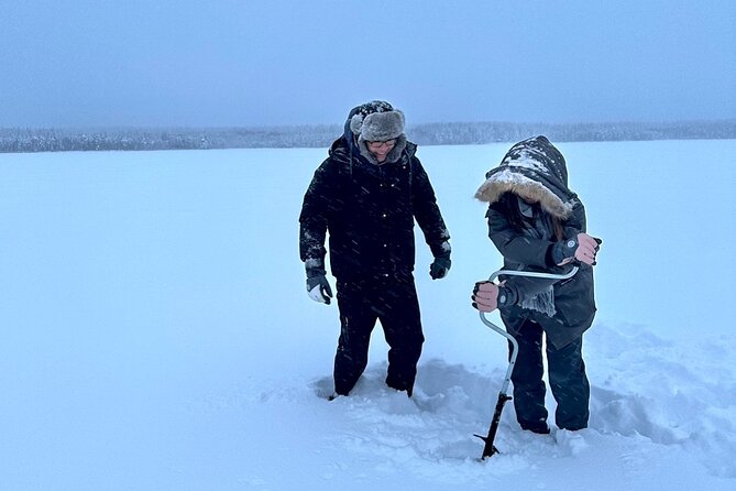 Ice Fishing in Rovaniemi - Making your first hole in the ice