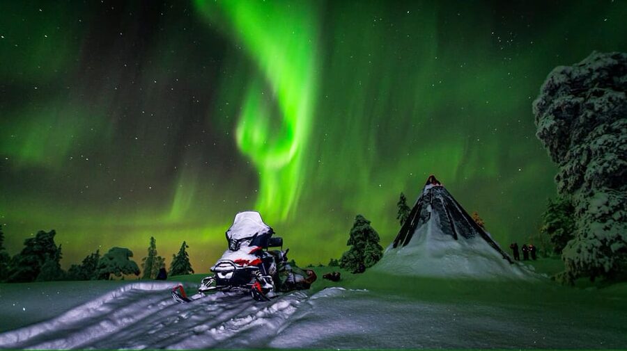 Inari: Northern Lights Hunt Snowmobile Safari - Hunting the Northern Lights under an open sky