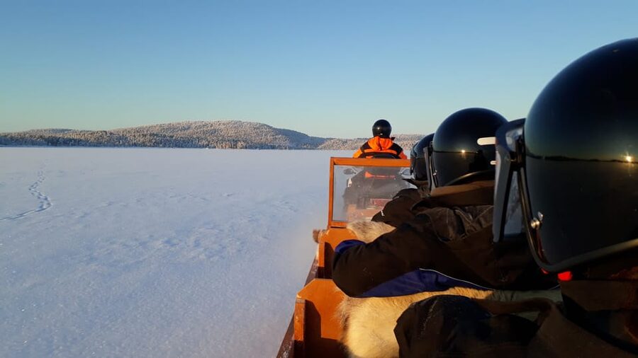 Ivalo: Ice Fishing Tour to Lake Inari, Reindeers & Lunch - A snow-covered island with a family connection