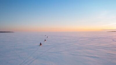 Ice Fishing Safari with Snowmobiles