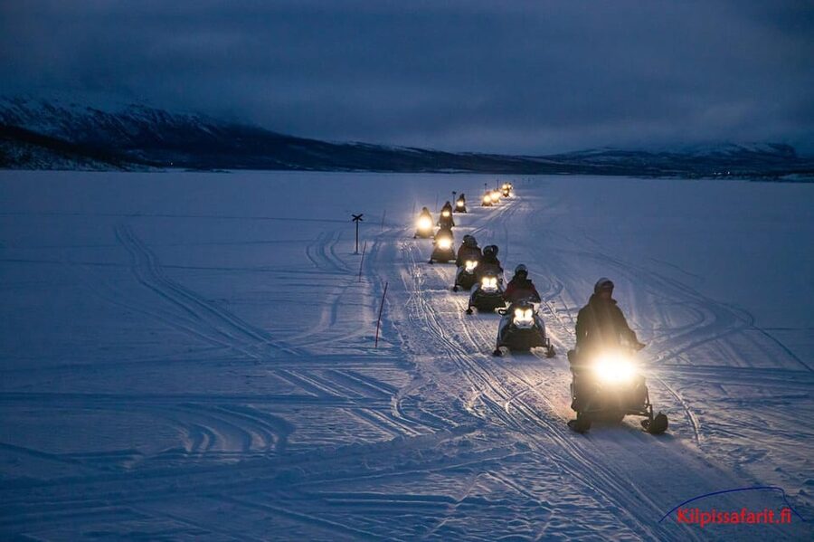 Kilpisjärvi: Border of Three Countries Snowmobile Safari - The yellow cairn at Koltavuoma