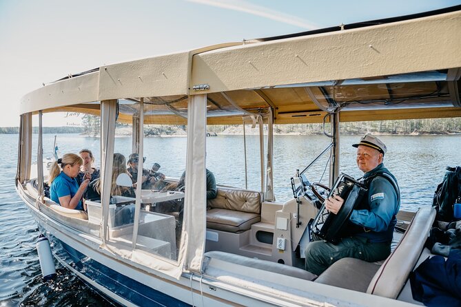 Lake Saimaa Small-Group Cruise with Stories and Music - Seeing Puumala from the lake