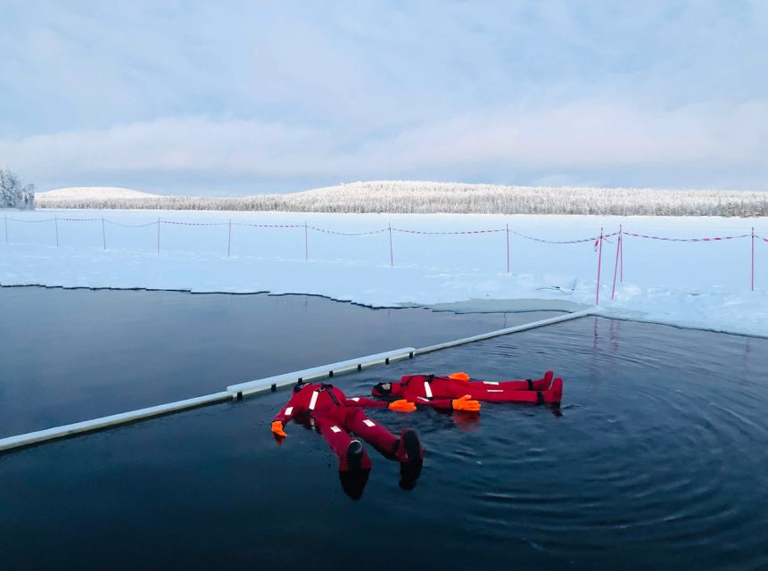 Lapland: Ice Fishing, Floating & BBQ Snow Adventure - The salmon BBQ in the kota