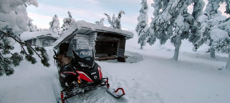 Lapland: Private Snowmobile Safari with arctic Local Guide - Riding through the Luosto Mountain Area