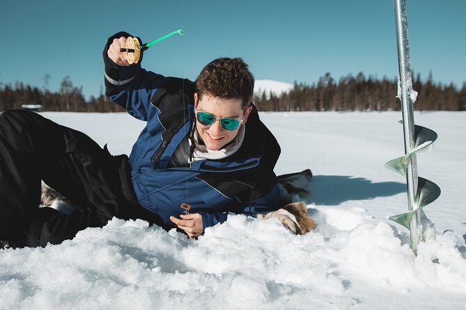 Lappish Lunch Break -Snowmobiling, ice fishing and tasty food - Returning to Rovaniemi after lunch