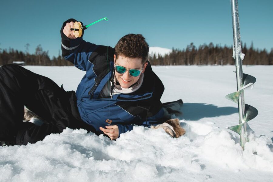 Levi: Finnish Ice Fishing Tour by Car - Waiting for a Fish Beneath the Ice