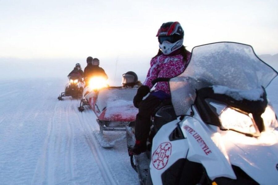 Levi: Lapland Family Snowmobile Safari - Riding through Lapland’s winter scenery
