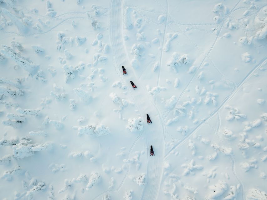 Levi: Snowmobile Safari with Ice Fishing and Outdoor Lunch - From Safartica’s Levi office to the frozen wilderness