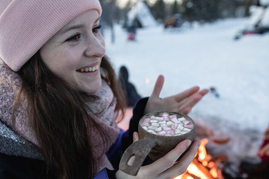 Levi: Snowmobile Safari with Ice Fishing and Outdoor Lunch - Learning the quiet skill of ice fishing