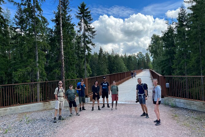 National Park Hike & Finnish Smoke Sauna Experience with Campfire Lunch - Campfire lunch beside the lake