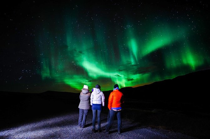 Northern Lights Hunt from Rovaniemi with Folk Tales and Snacks over Campfire - A dark lake or forest site for aurora watching