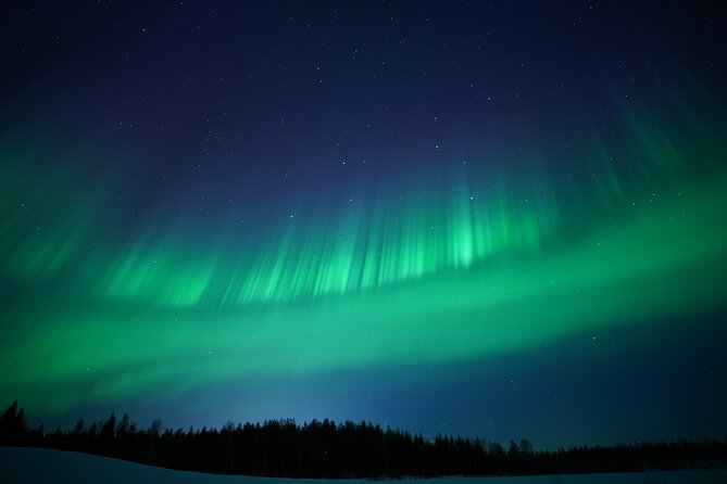 Northern Lights Hunting Photography Tour in Rovaniemi Finland - Photographing you beneath the aurora