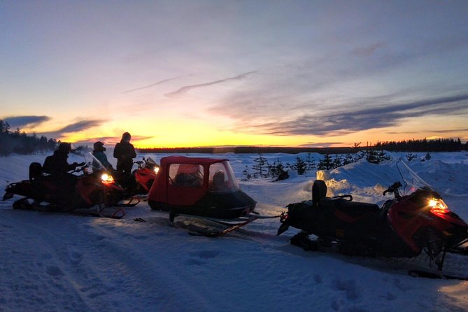 Northern Lights Night by Snowmobile (private tour) - Through the forest and across the lakes