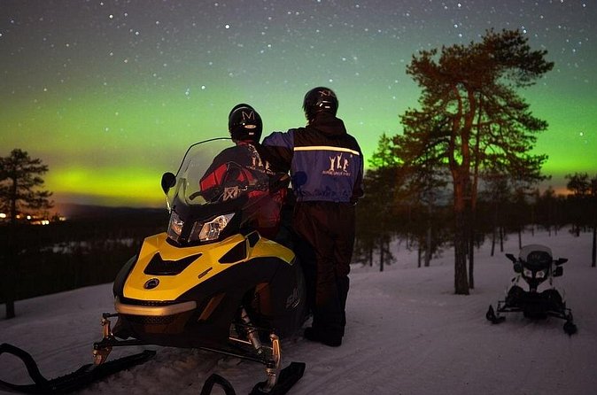 Northern Lights Snowmobile Hunt - Two people, one snowmobile, or pay for one machine