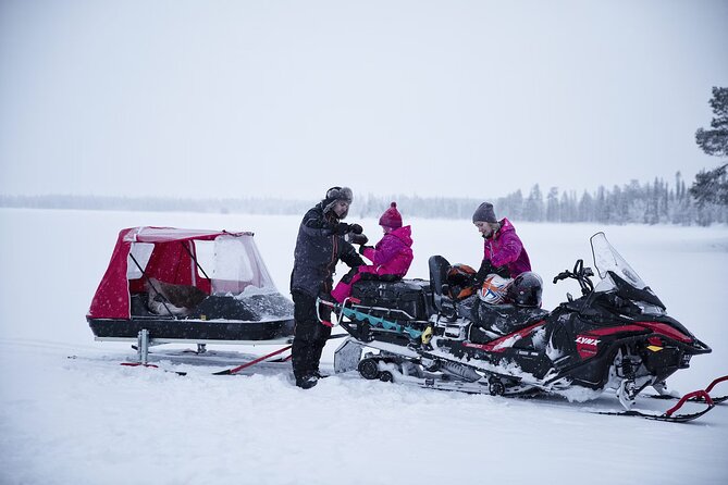 Northern Lights Snowmobile Sledge Ride in Rovaniemi - Through the snowy forest by snowmobile sledge