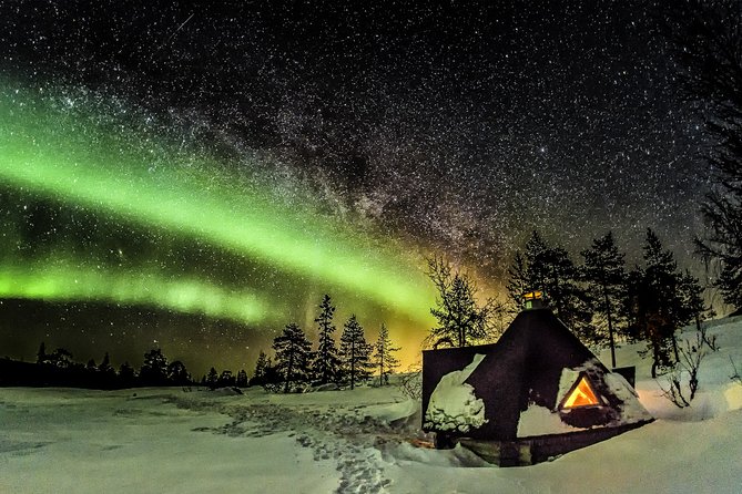Northern Lights Snowmobile Sleigh Ride - The summit watchtower and its wide sky