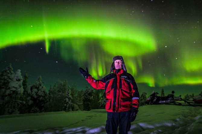 Northern Lights Snowmobile Sleigh Ride - Riding through the snowy countryside