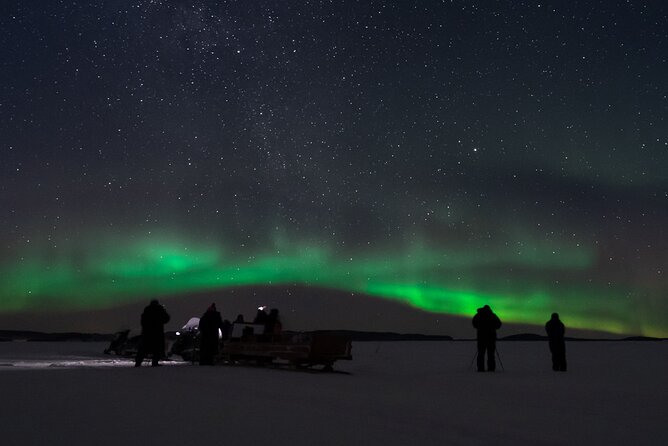 Northern lights tour to Lake Inari from Ivalo, Reindeers & Dinner - The snowmobile-pulled sledge across the frozen lake