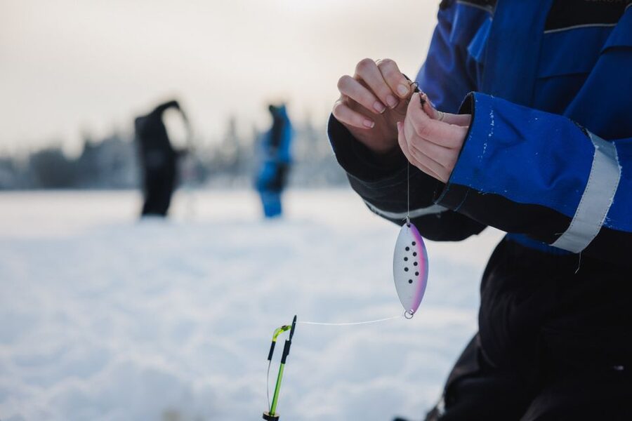 Rovaniemi: Arctic Circle Ice Fishing Experience - Drilling the hole and learning the old method