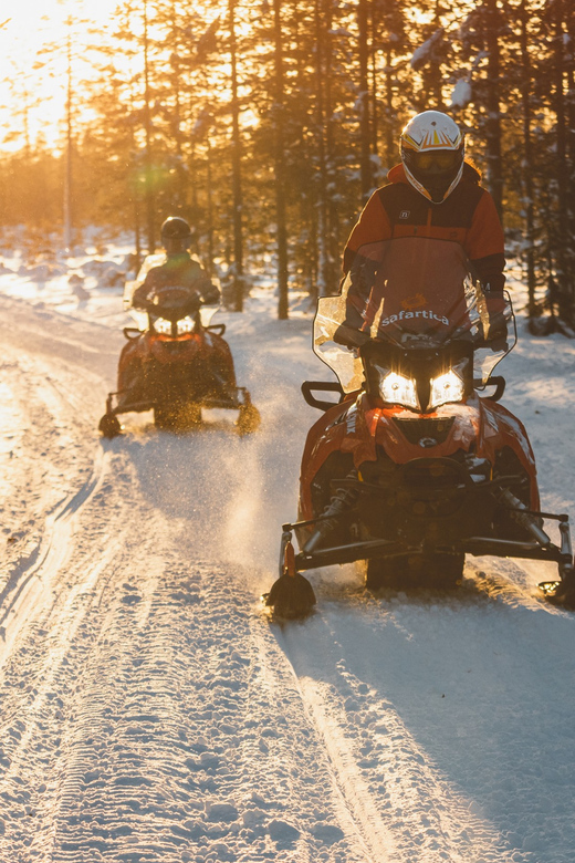 Rovaniemi: Family Snowmobile Trip with Guide and Picnic - Riding through the snowy wilderness