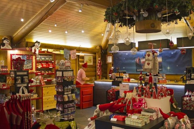 Rovaniemi Guided Tour and Santa Claus Village - Meeting Santa and handling the photograph cost