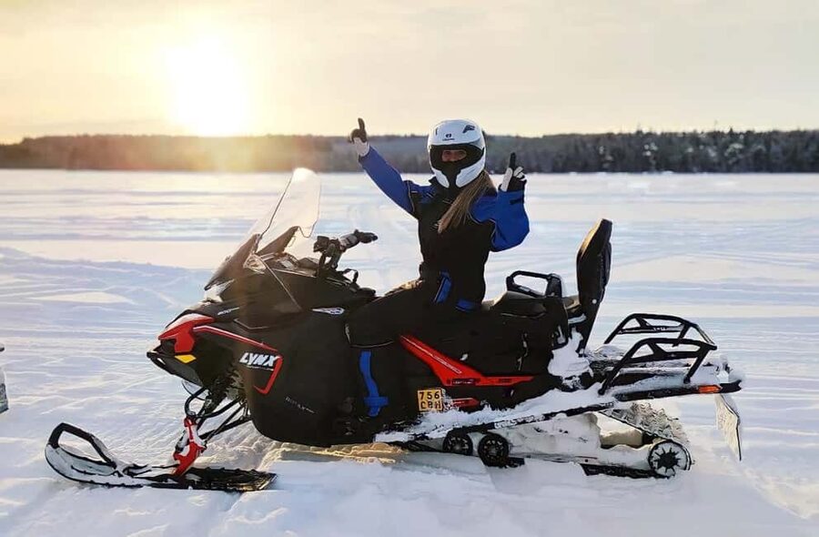 Rovaniemi: Guided Wilderness Snowmobile Safari & Barbeque - Getting dressed for the Arctic ride