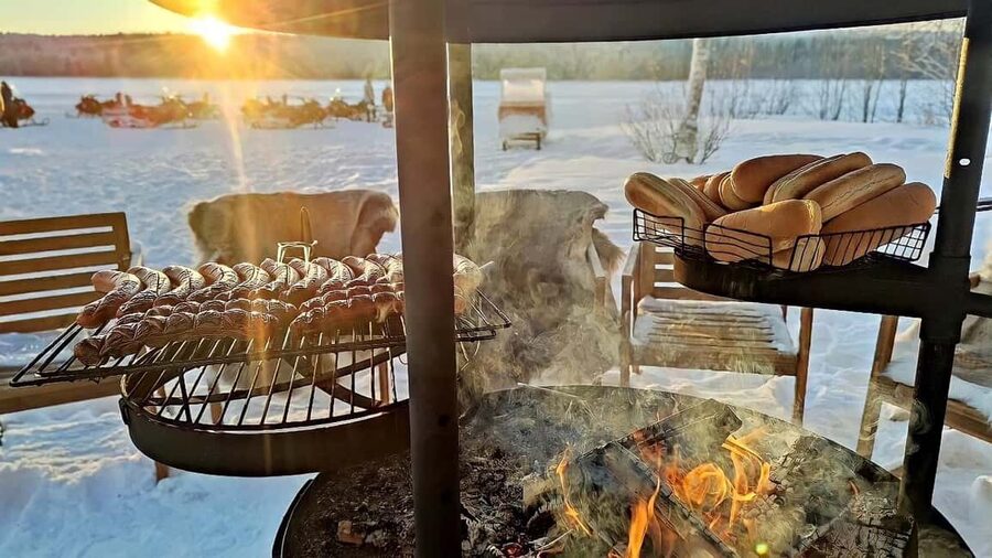 Rovaniemi: Ice Fishing Small Group Tour & Barbeque - Waiting for a catch on the ice