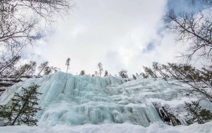 Rovaniemi: Korouoma Canyon and Frozen Waterfalls Tour - Hiking past cliffs, rapids, and frozen waterfalls