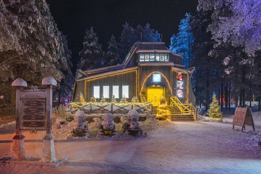 Rovaniemi: Search for Northern Lights Snowmobiling Trip - Getting dressed for a Finnish winter ride
