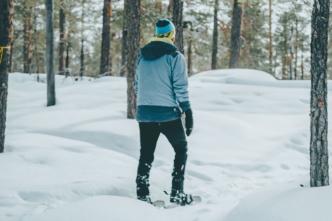 Rovaniemi: Snowshoeing in a magical snowy forest - The fire, hot juice, and sausage break
