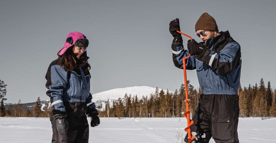 Saariselkä: Arctic Ice Fishing Experience - Getting dressed for two and a half hours outdoors