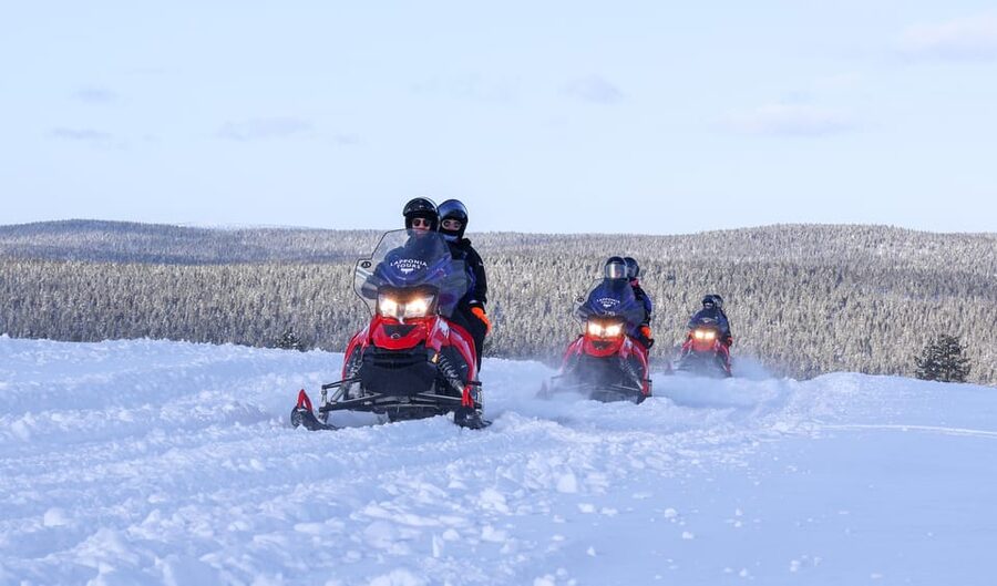 Saariselkä: Ice Fishing Safari by Snowmobile - Riding through Saariselkä’s snowy forests and fells