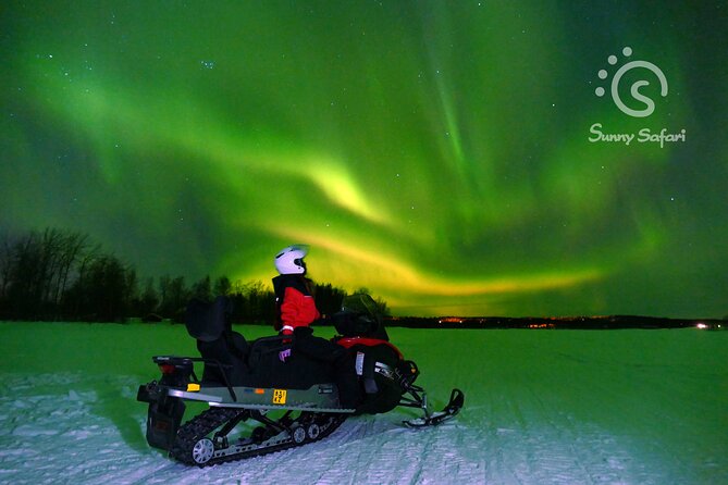 Searching Aurora with Snowmobile - Starting the ride from Santa Claus Village
