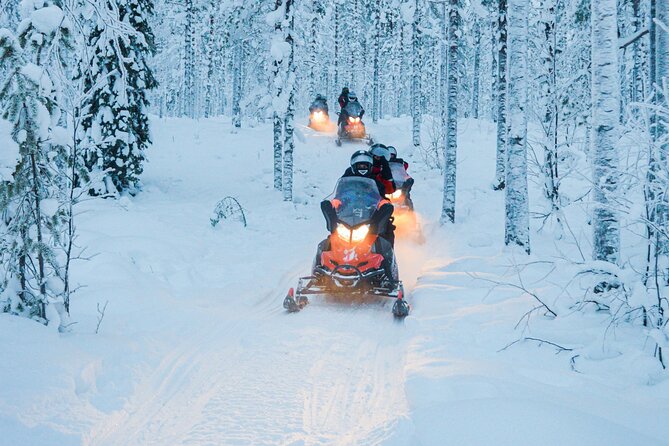 Small-Group Snowmobile Experience in Rovaniemi - Getting dressed for the Arctic
