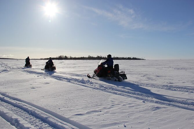 Snowmobile Adventure in Lapland - Taking turns behind the handlebars