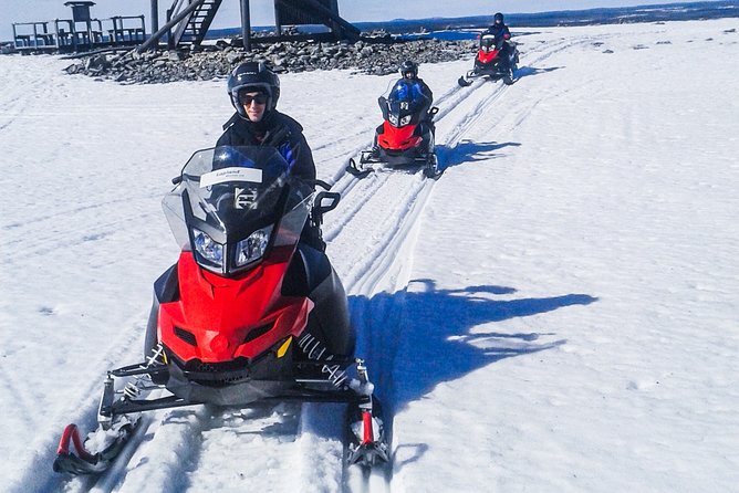 Snowmobile Safari in the Nature - Morning start - Following snowy trails through forests and swamps