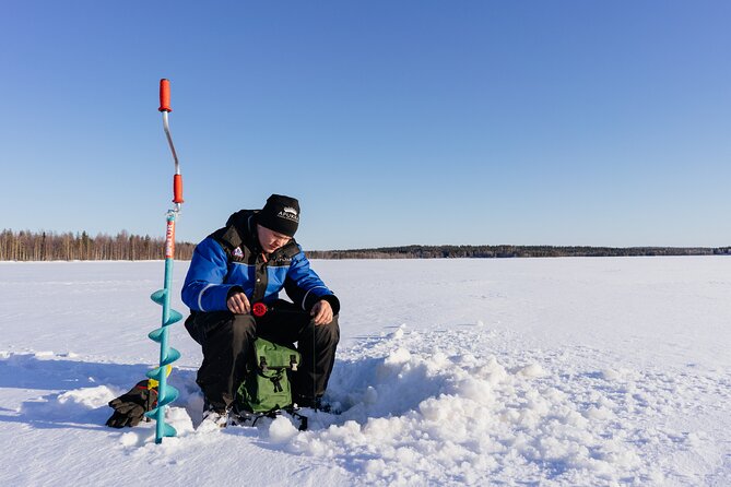 Snowmobiling and ice fishing in Apukka Resort, Rovaniemi - The frozen pond and the ice-fishing lesson
