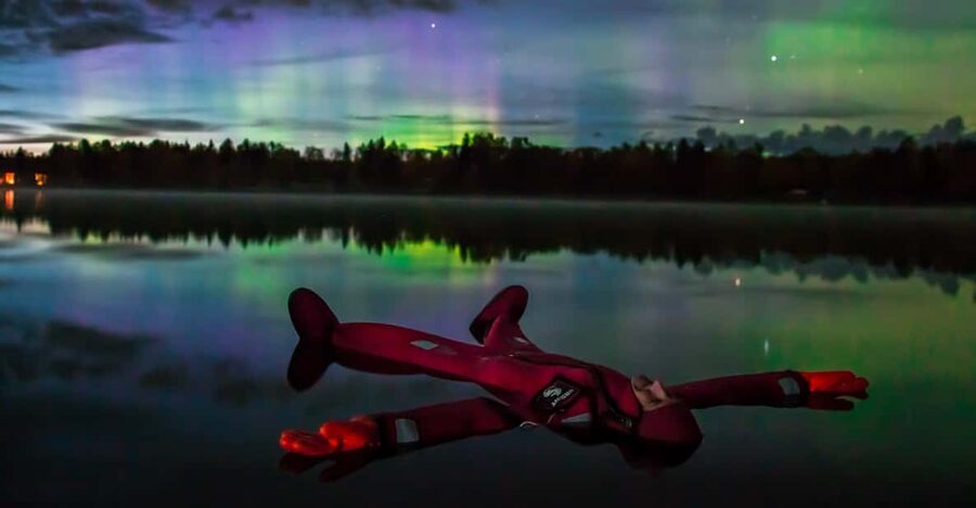 Ylläs: Northern Lights Ice-Floating Experience with Transfer - Getting ready in the warm cabin
